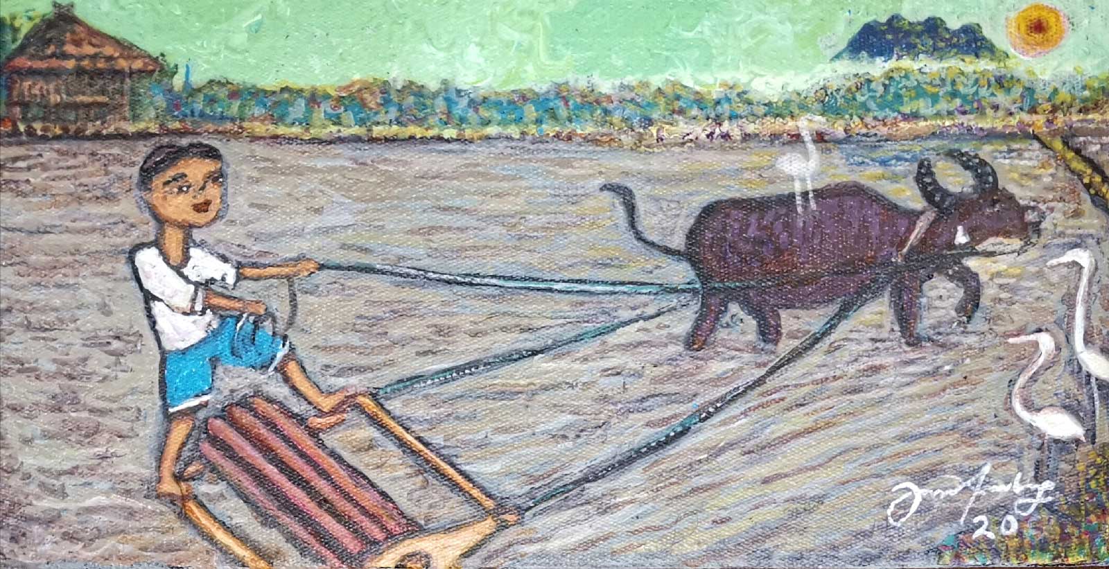 Ploughing-the-Paddy-Fields-by-Jainal-Amambing